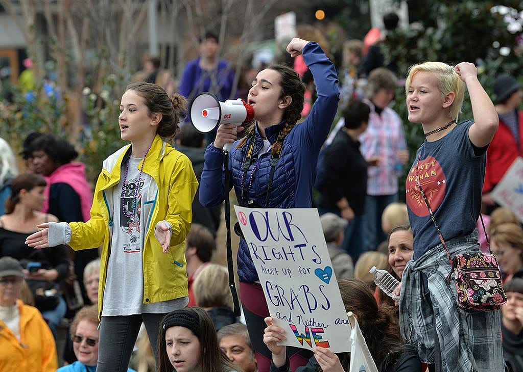 Young girls attend a Women's March in Charlotte in 2017.