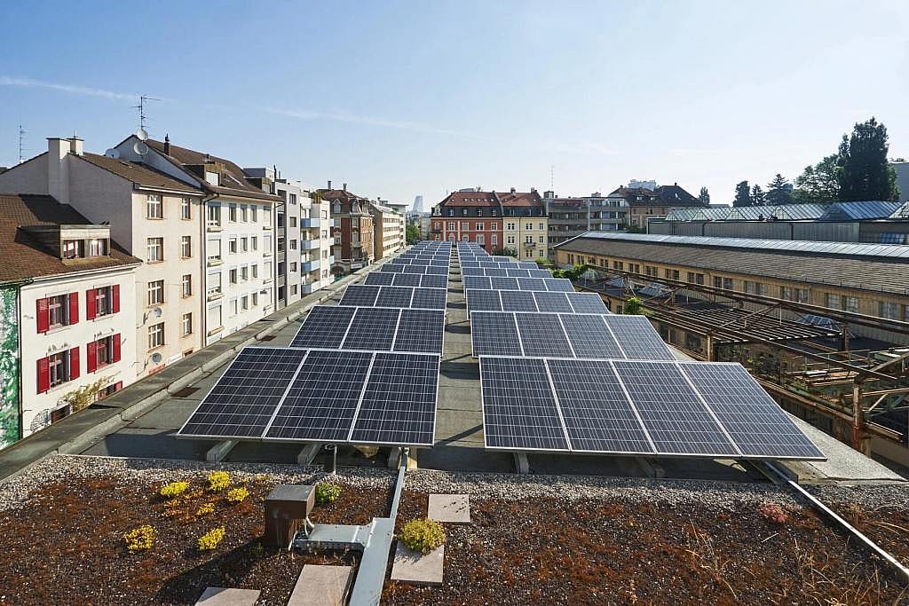 Solar panels on the roof of Gundeldinger Feld.