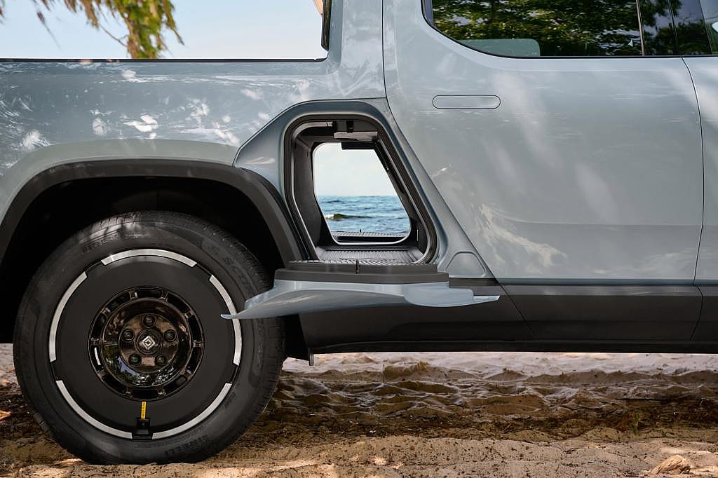 Close-up view of the Gear Tunnel storage area on a 2026 Rivian R1T.