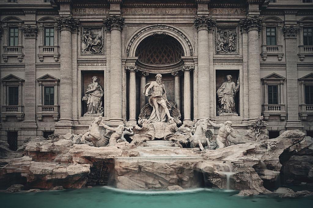 The Trevi Fountain with Baroque style seen as a famous tourism attraction in Rome, Italy.