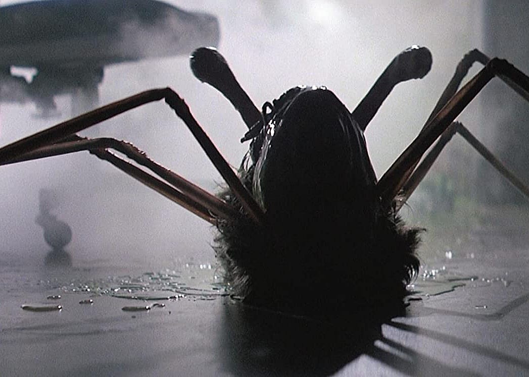 A giant spider-like alien.