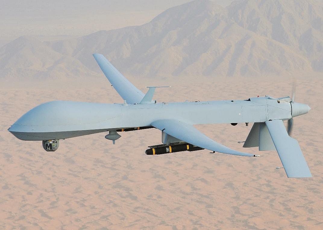 Pictured: An MQ-1 Predator, armed with AGM-114 Hellfire missiles, piloted by Lt. Col. Scott Miller on a combat mission over southern Afghanistan