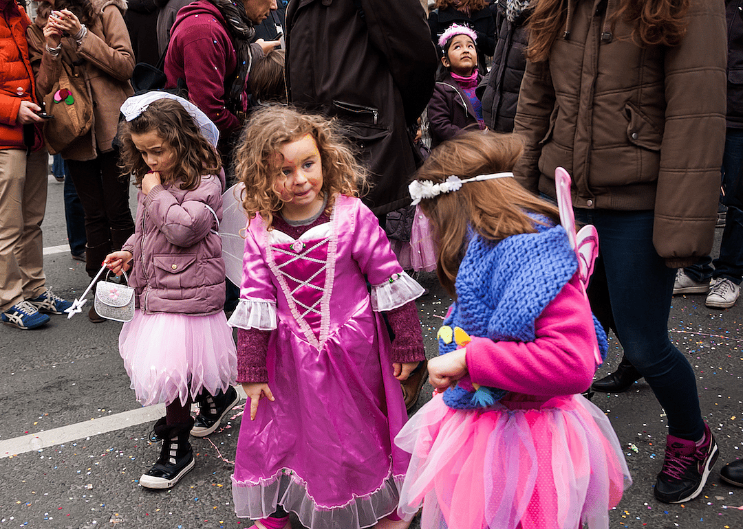 Spiderman and princesses lead the costume parade.