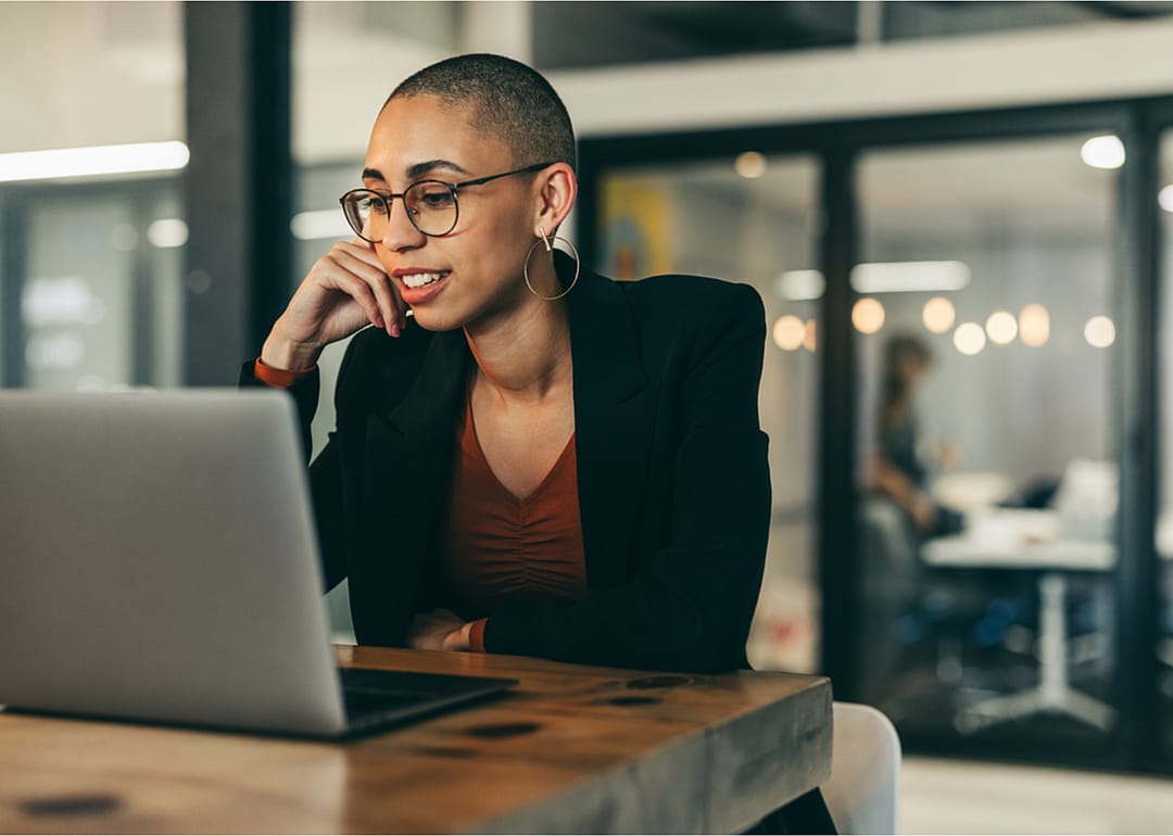 Confident businessperson speaks on videoconference.
