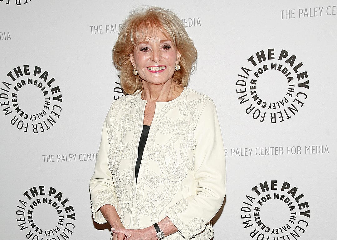 Barbara Walters poses on at an event.