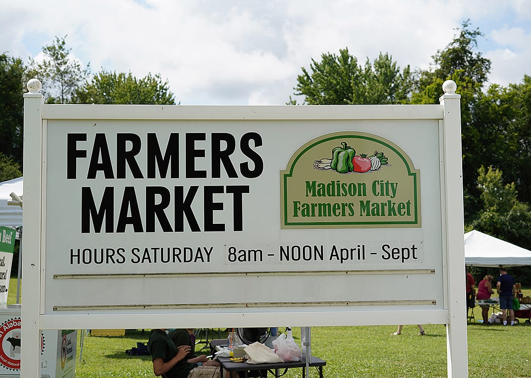 Sign advertising Madison farmers market.