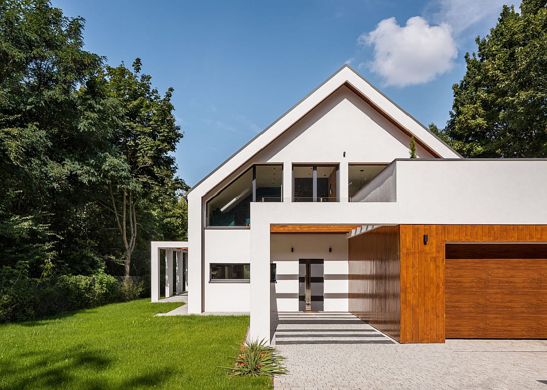 Exterior of white minimalist modern home.