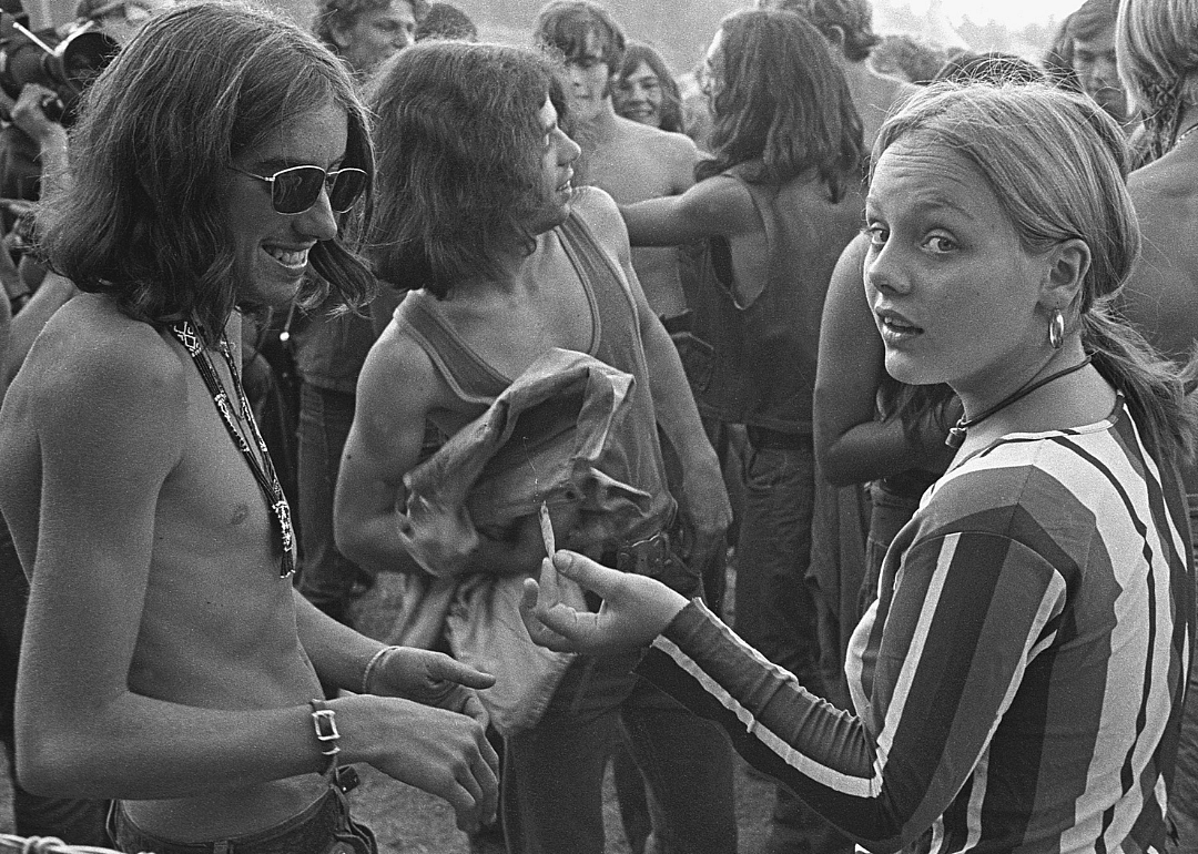 People share marijuana at festival.