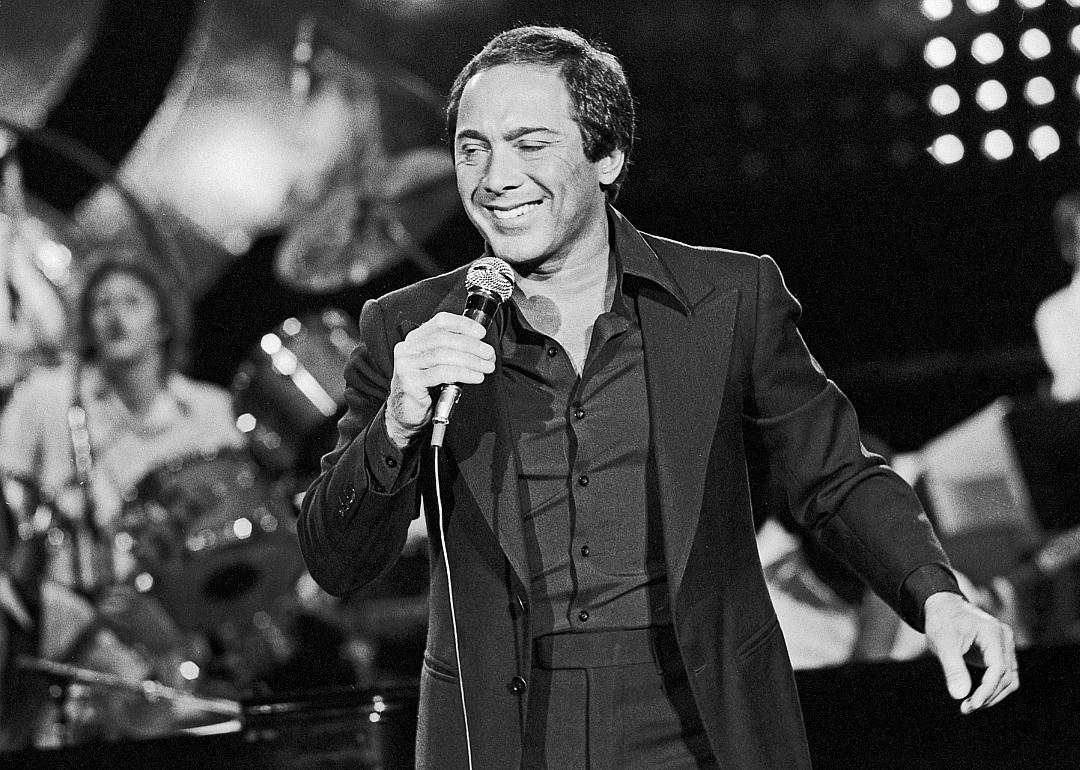 Paul Anka performing on stage.