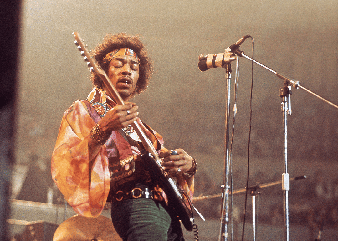 Jimi Hendrix performs live onstage.