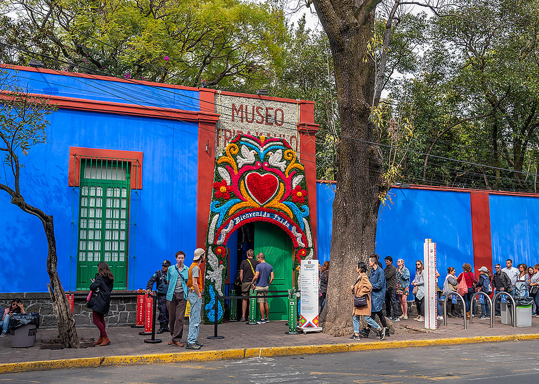 People wait in line to visit Casa Azul in Mexico City.