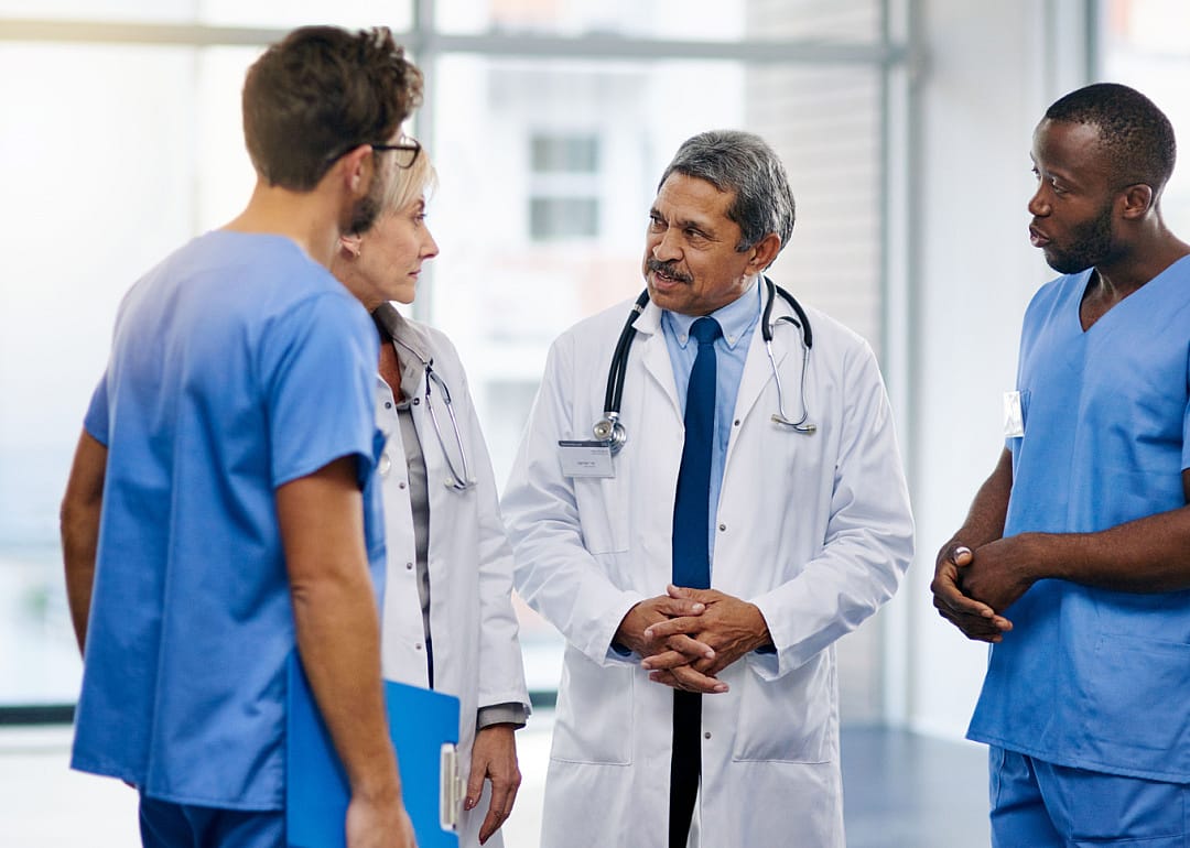 Medical professionals having discussion.