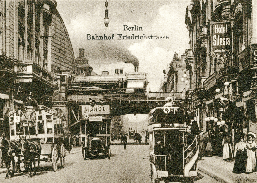 Steam train travels along bridge in Berlin