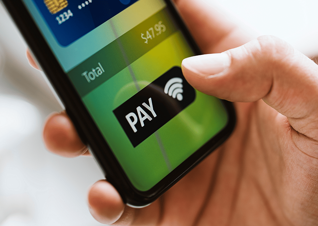 Person using mobile payment app.