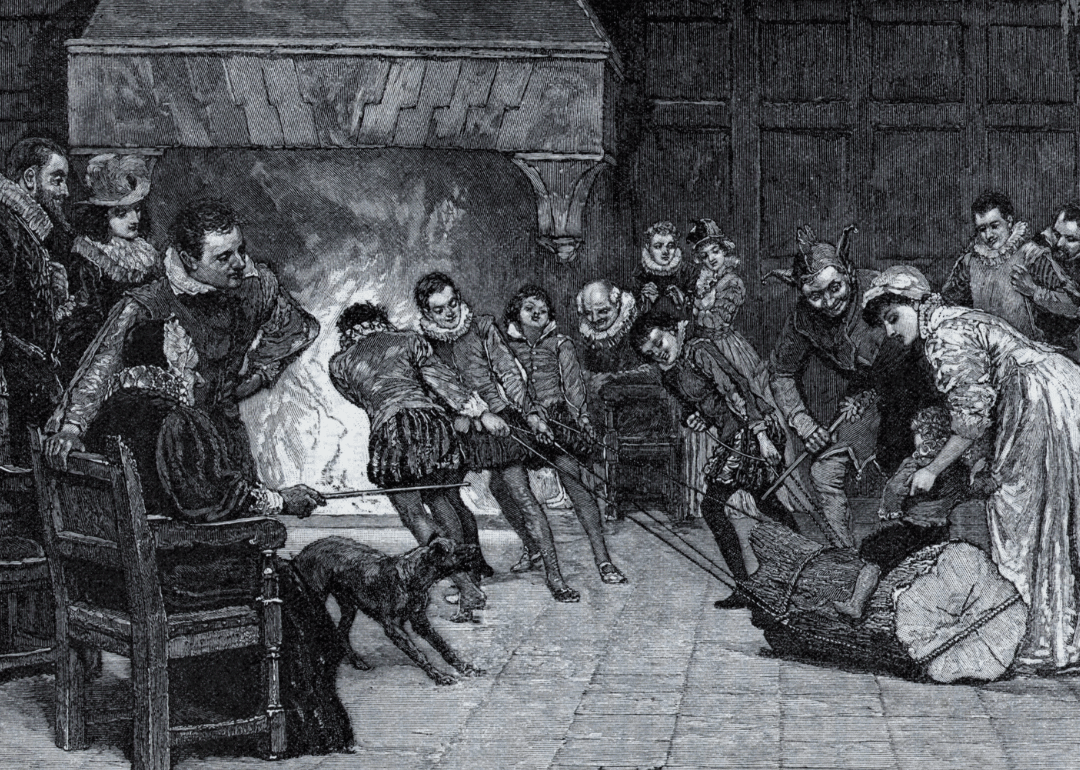 An engraving by H.M. Paget titled Hauling in the yule log.
