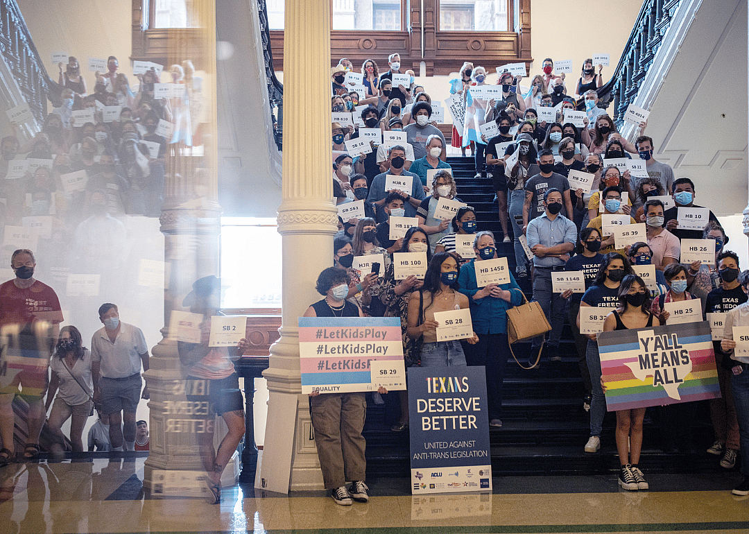 LGBTQ rights supporters gather at the Texas State Capitol.
