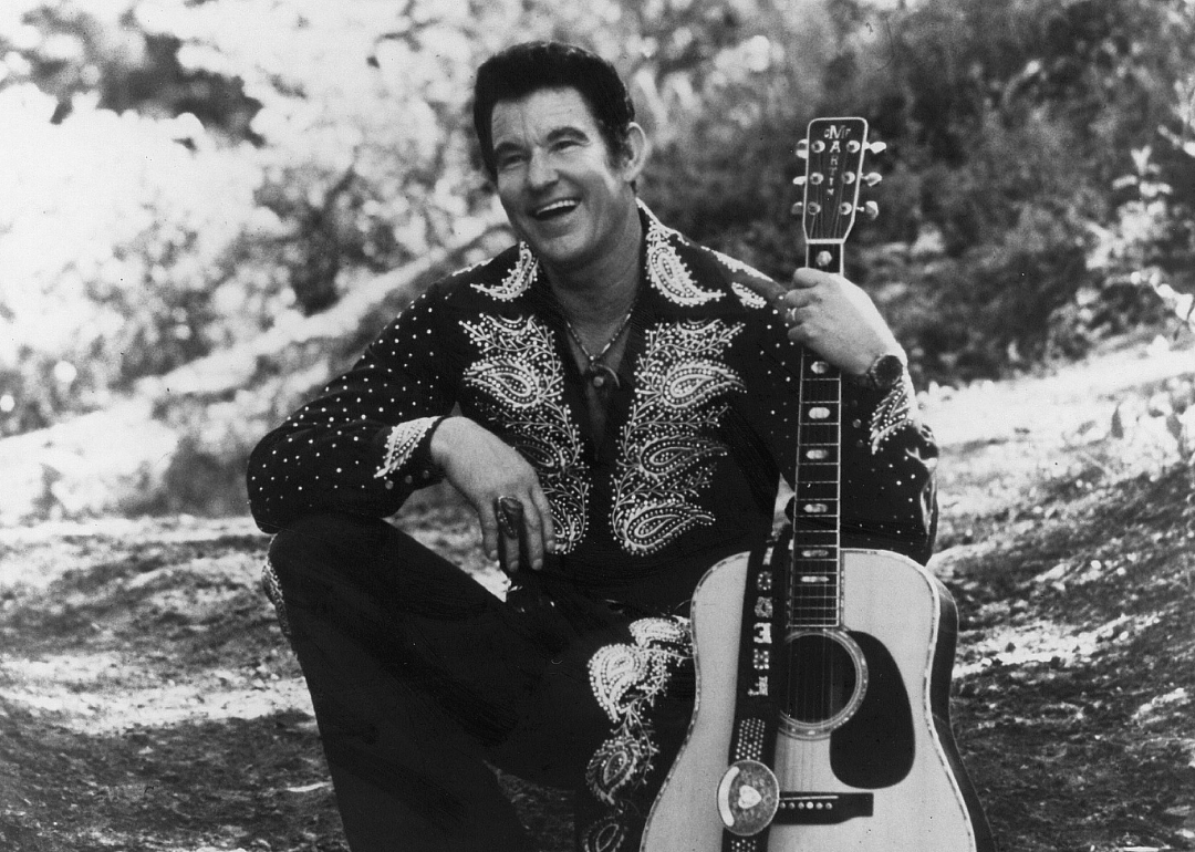 Freddie Hart poses with guitar