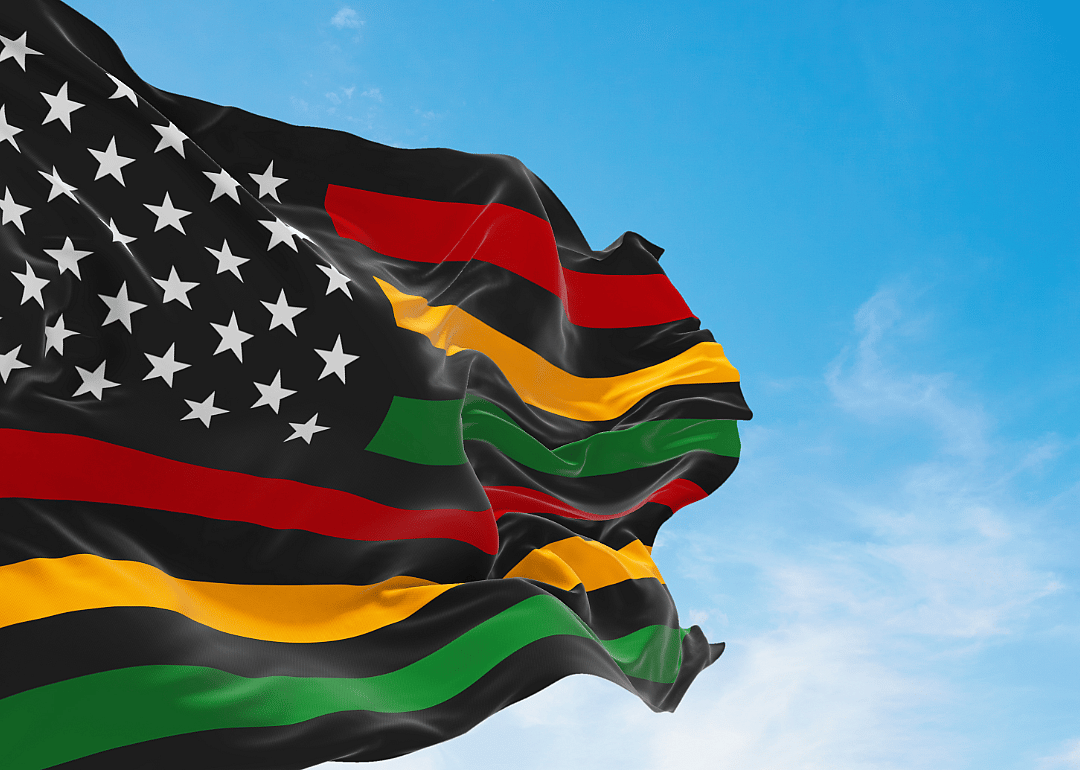 American flag with black, red, yellow-orange, and green colors as the stripes.