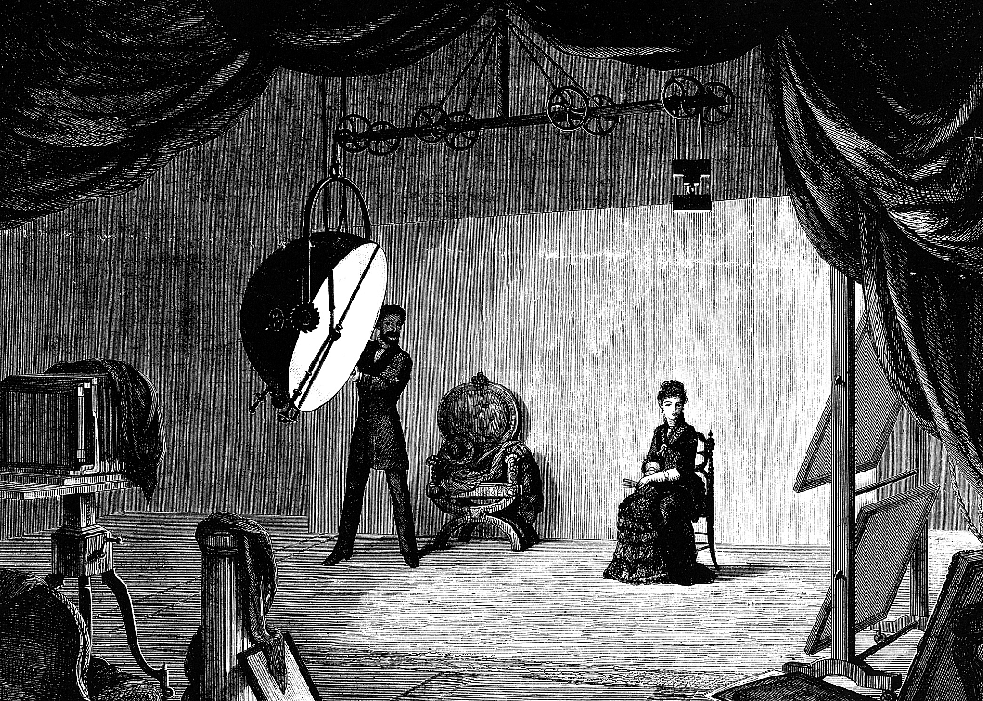 Engraving depicting arc lights being used in a photographer’s studio.