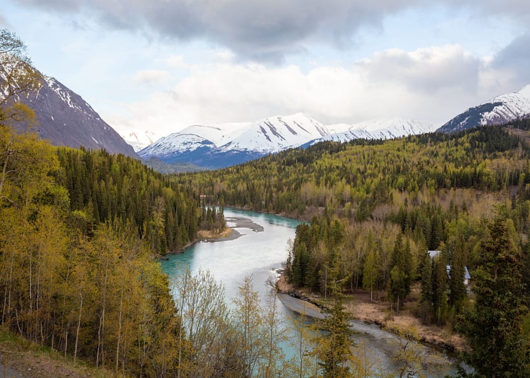 An aerial view of the Kenai River in the mountains.