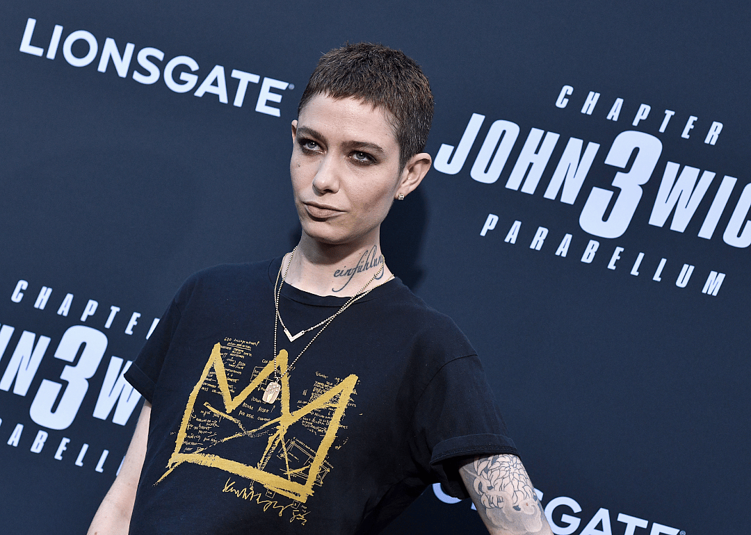 Asia Kate Dillon poses at ‘John Wick 3’ premiere.