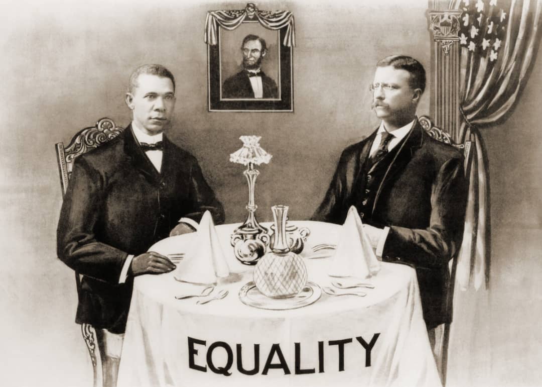 Commemorative print depicting Booker T. Washington dining with President Roosevelt. The tablecloth has the word equality written on it. 