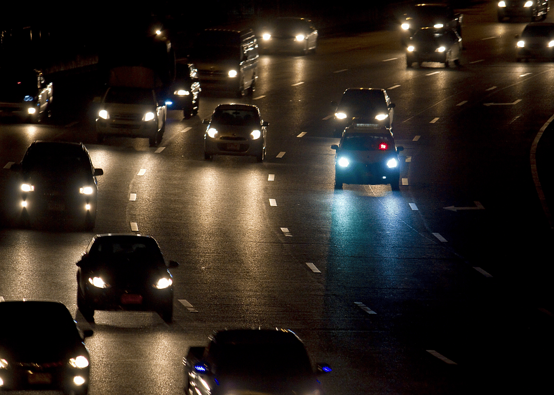 Cars driving on highway at night