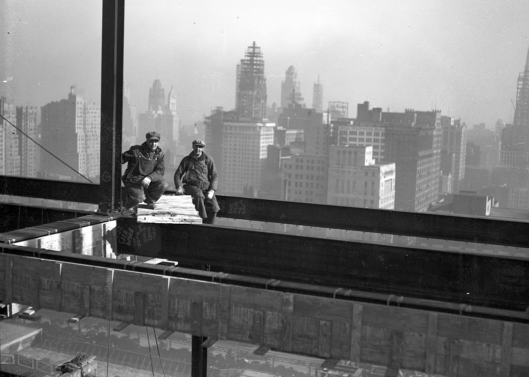 Construction workers on steel frame