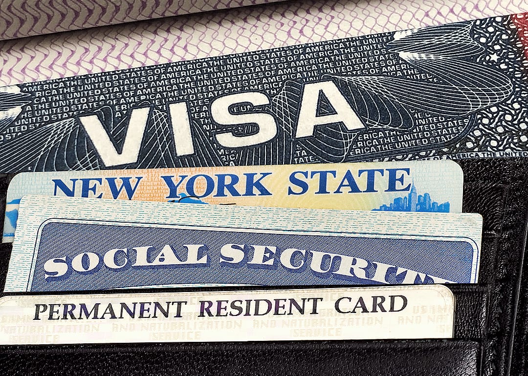 Wallet with U.S. Visa, driver license, social security card and green card.