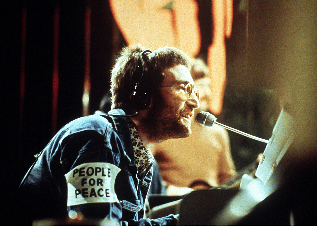 John Lennon performing at piano