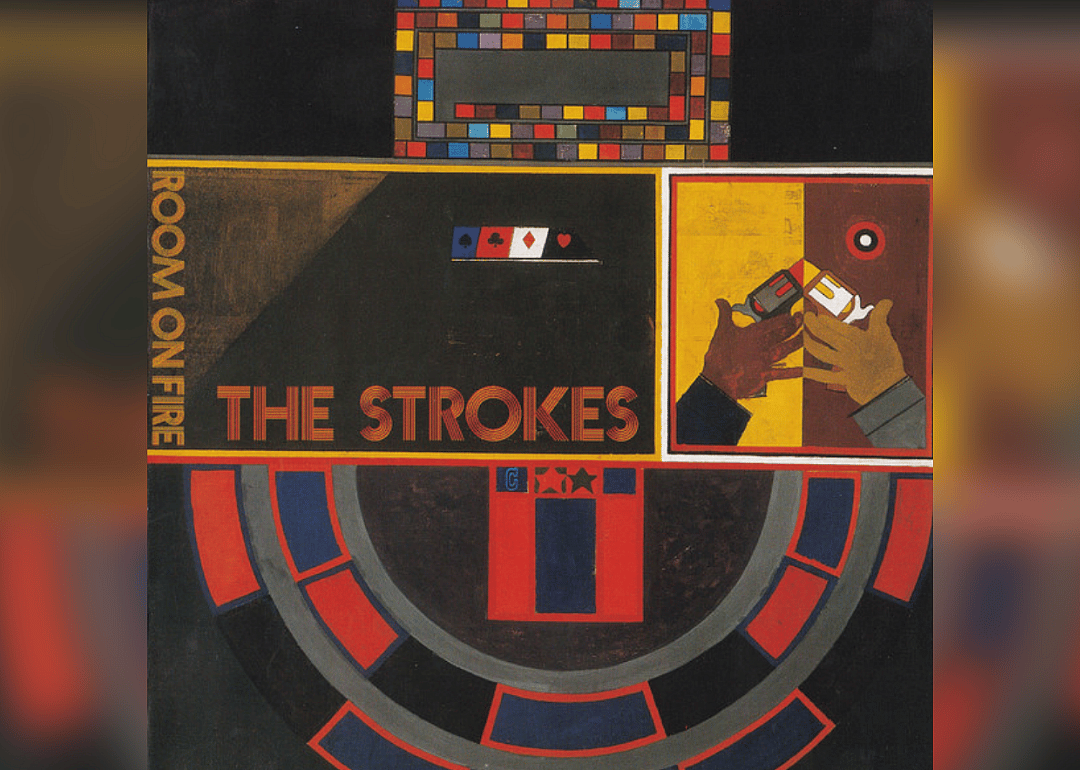 The album cover has a colorful background with two hands pointing guns upward.