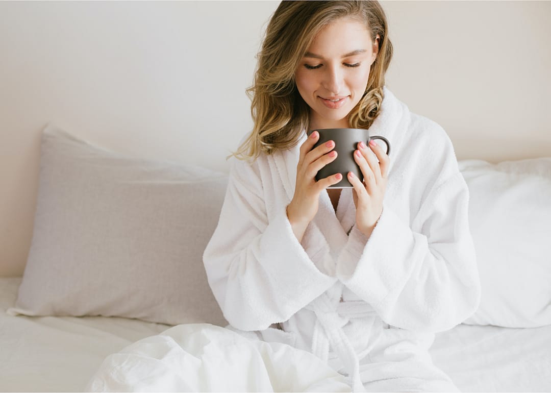 Invest in a fluffy robe and cozy slippers