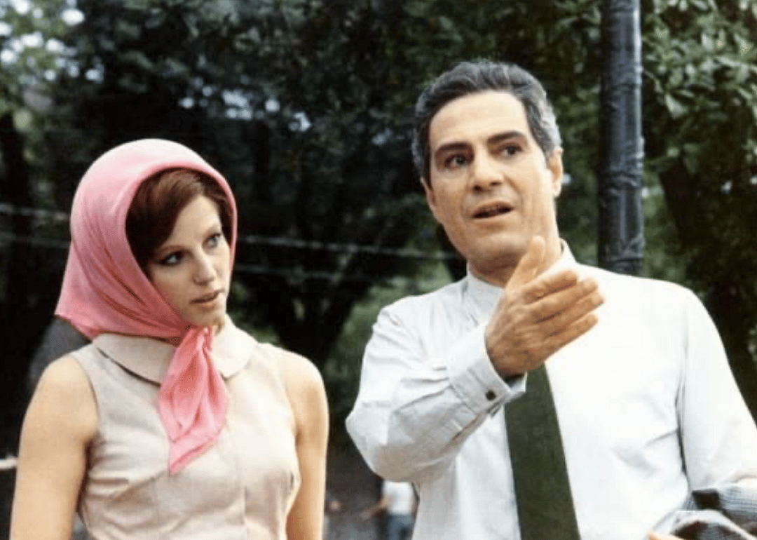Nino Manfredi and Stefania Sandrelli talk in a scene from ‘We All Loved Each Other So Much’