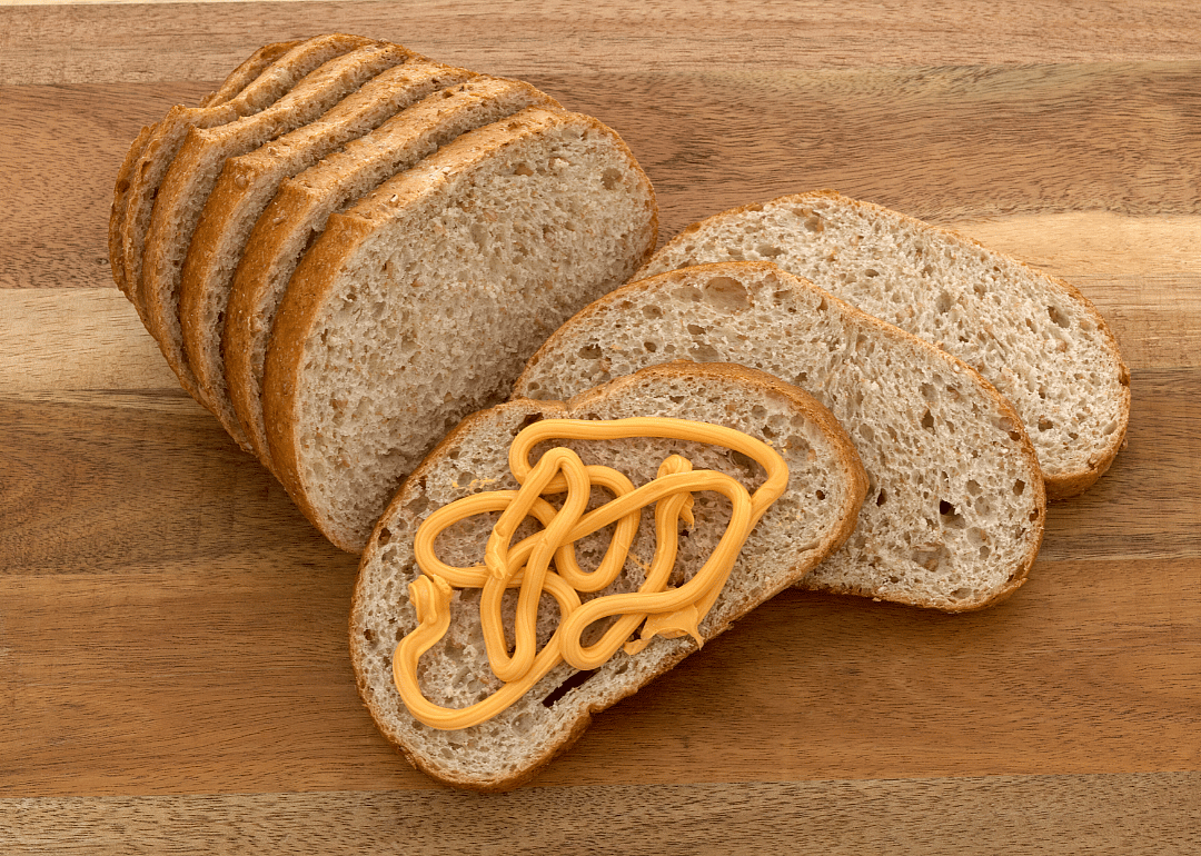 Canned cheese on sliced bread.