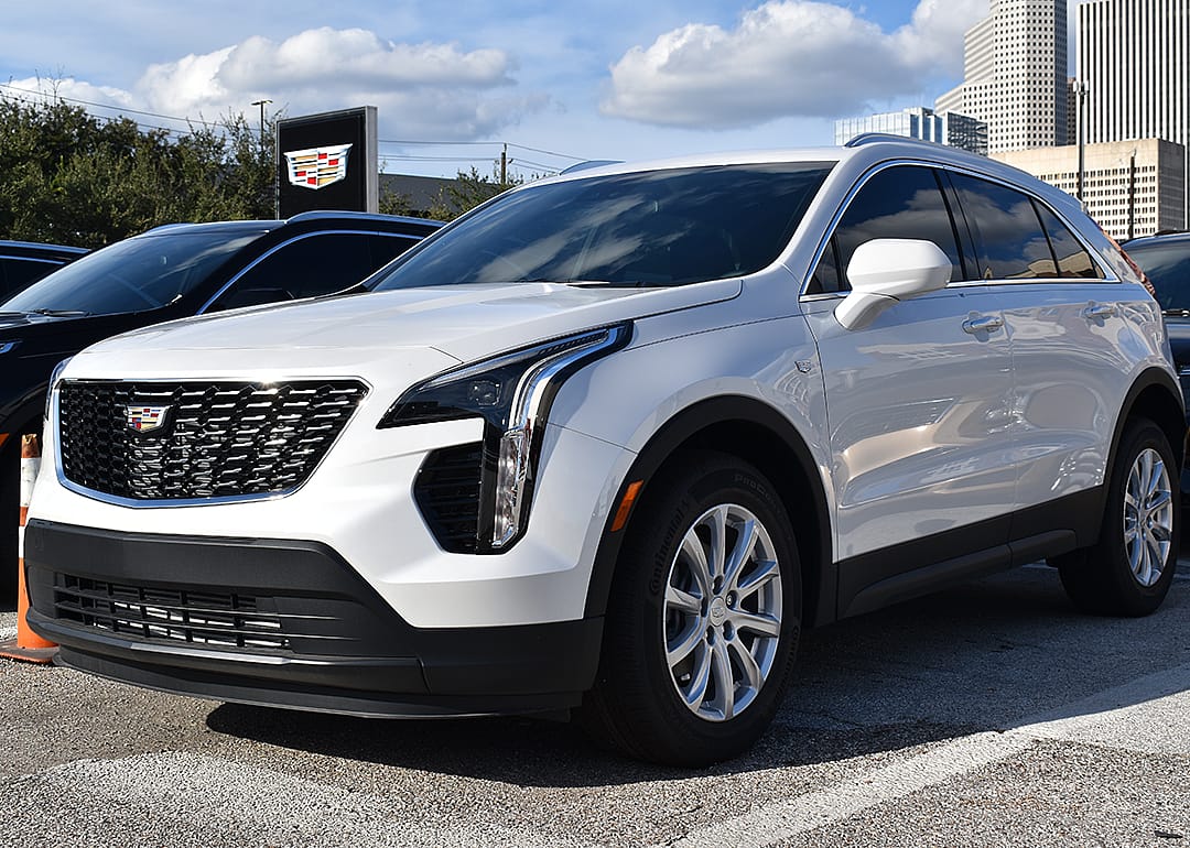 White Cadillac CT5 in dealer lot.