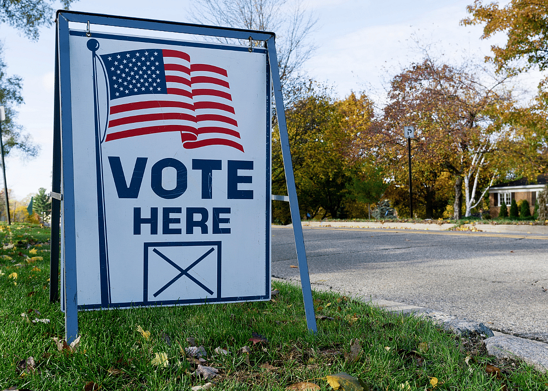 “Vote Here” polling place sign in neighborhood.