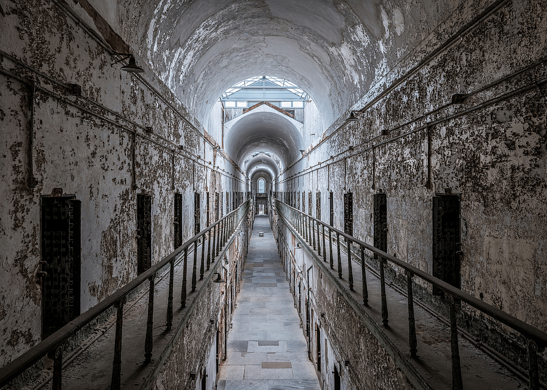 Peeling paint walls in abandoned cell block in the Eastern State Penitentiary.
