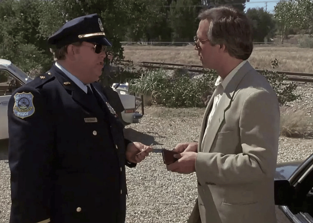 Chevy Chase and John Candy in a scene from ‘Nothing But Trouble’.