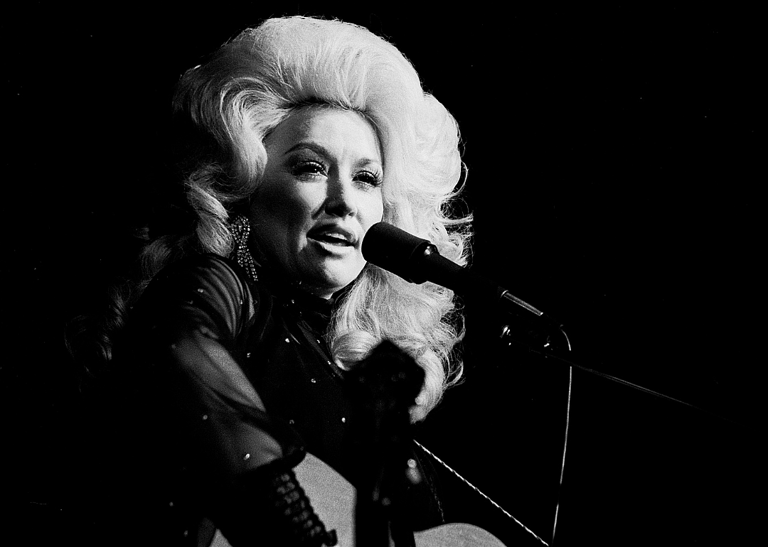 Dolly Parton performing onstage.