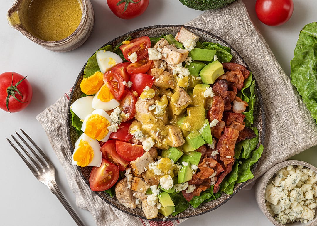 Cob salad served on plate.
