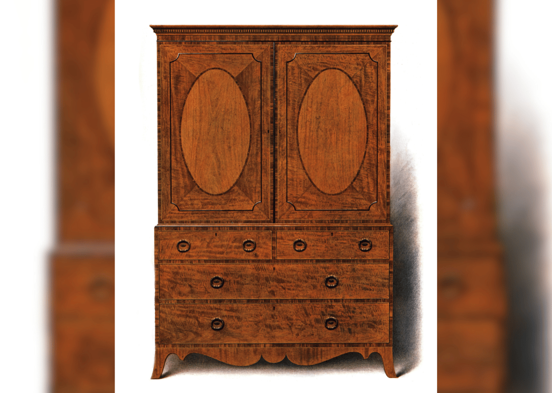 Lithographic print showing a mahogany and satinwood clothes press.