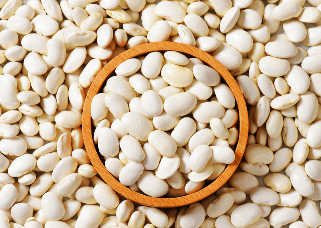 Bowl of uncooked lima beans.