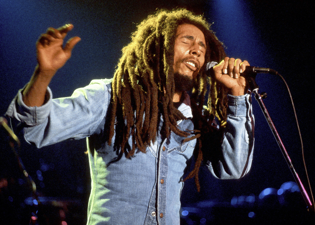 Bob Marley performing onstage.