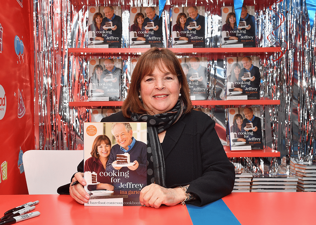 Ina Garten signs cookbooks at promotional event.