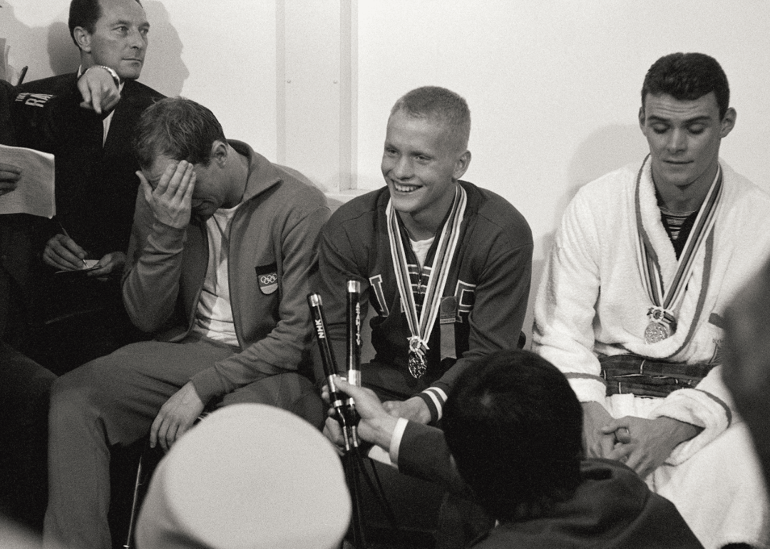 Swimmer Don Schollander wins a record four gold medals