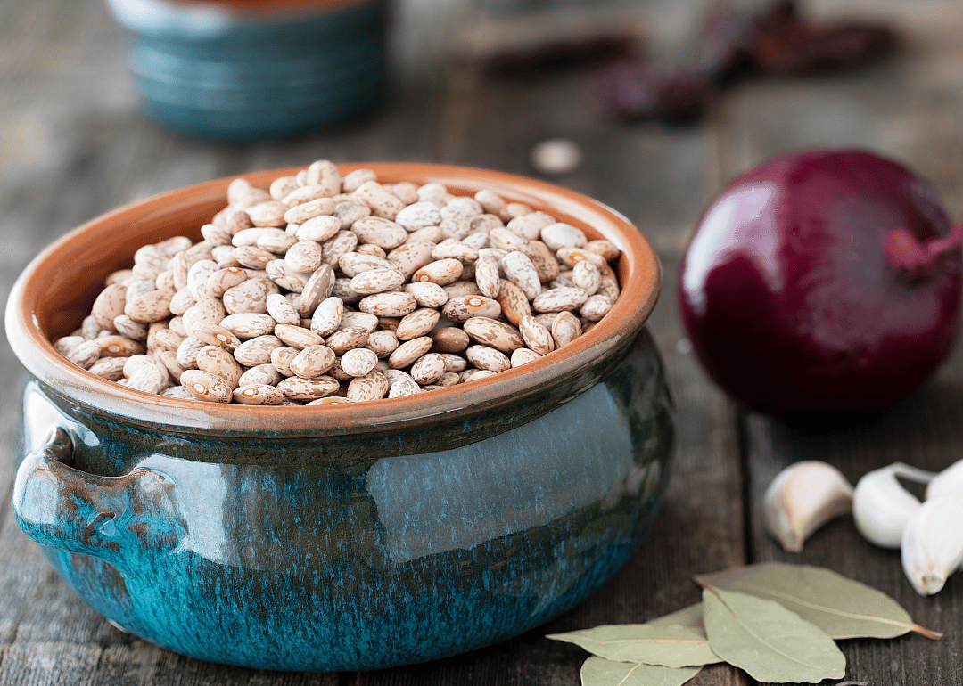Bowl of pinto beans and spices.