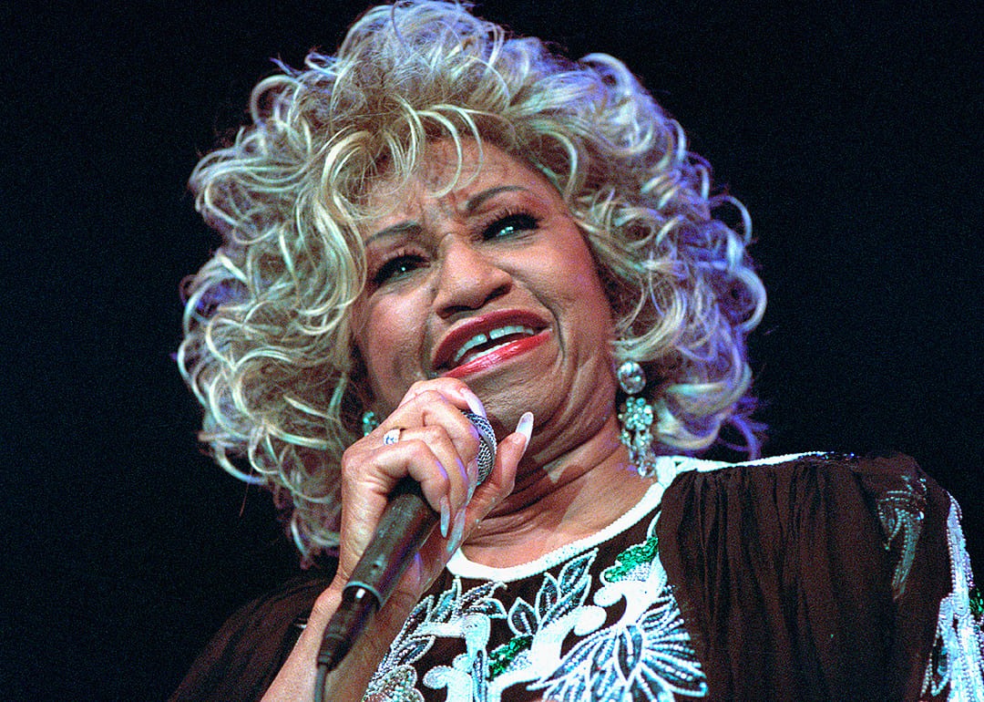 Celia Cruz performs on stage.