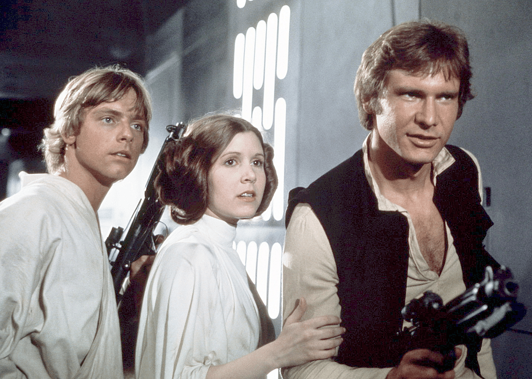 Mark Hamill, Carrie Fisher and Harrison Ford on the set of ‘Star Wars: Episode IV’