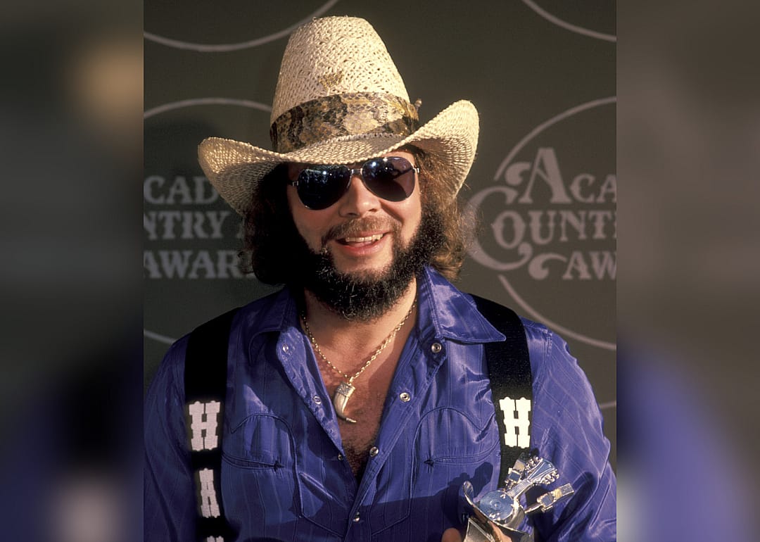 Hank Williams Jr poses with Academy of Country Music Award.
