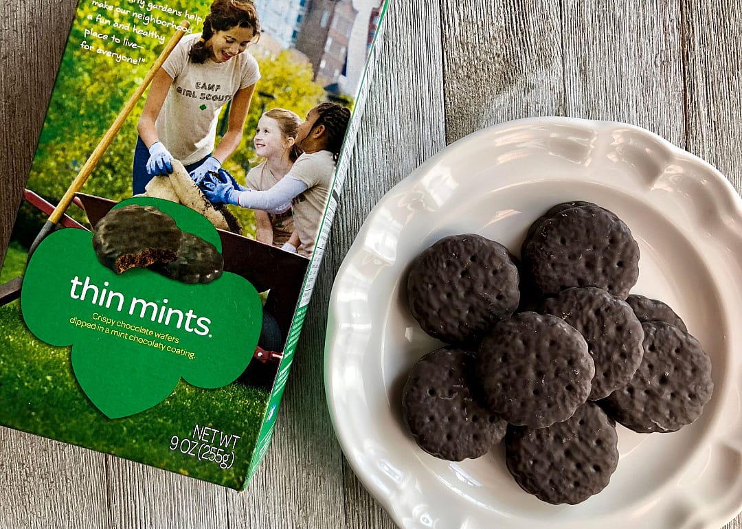 Plate of thin mint cookies displayed with Girl Scout cookie box.
